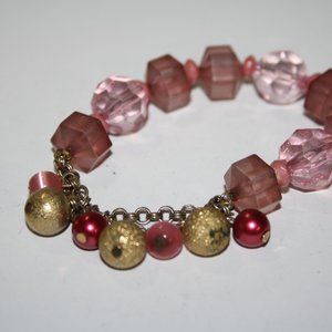 Beautiful pink and gold, beaded and chain bracelet 7"